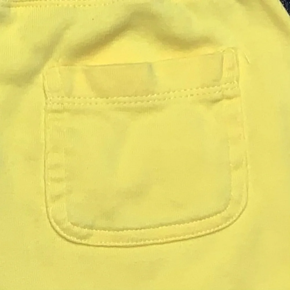 THE CHILDREN’S PLACE yellow tie front shorts.